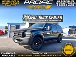 Black, 2004 Ford Excursion Thumnail Image 1