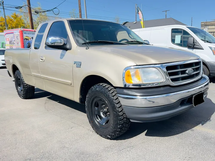 GOLD, 2000 FORD F150 SUPER CAB XLT Image 3