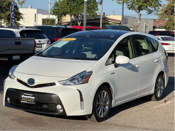 WHITE, 2016 TOYOTA PRIUS V Image 1