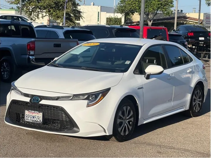 WHITE, 2020 TOYOTA COROLLA HYBRID Image 1