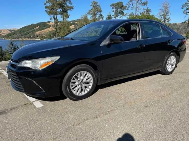 BLACK, 2017 TOYOTA CAMRY Image 1