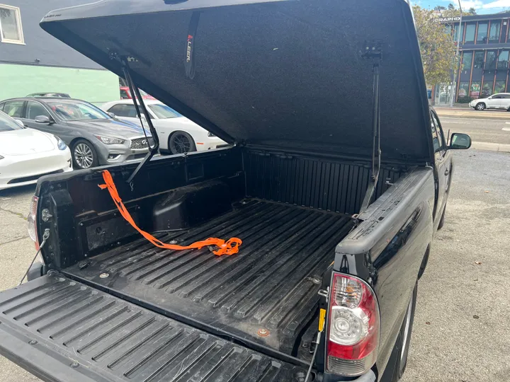 BLACK, 2011 TOYOTA TACOMA ACCESS CAB Image 24