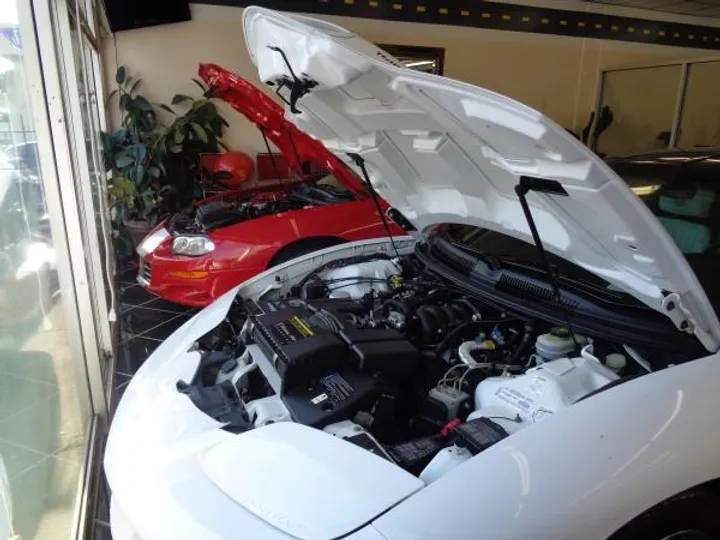 WHITE, 1999 PONTIAC FIREBIRD Image 9