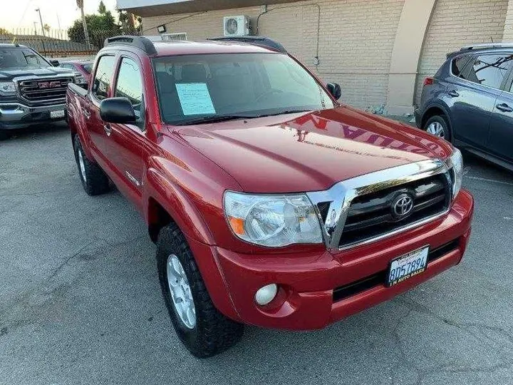 RED, 2006 TOYOTA TACOMA DOUBLE CAB Image 1