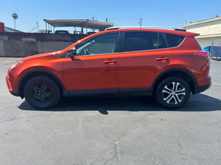 ORANGE, 2016 TOYOTA RAV4 Image 9