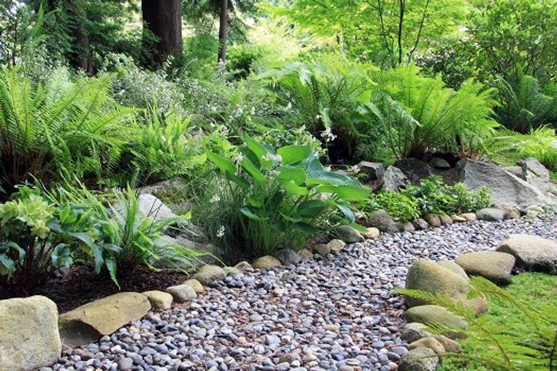 River rock pathway by Titan LLC in the Mat-Su Valley, Alaska
