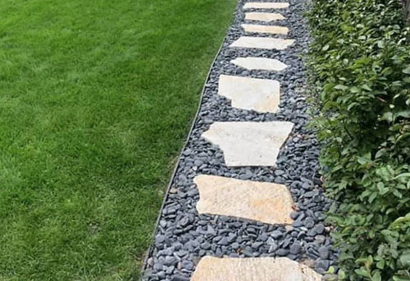 Flagstone stepping-stone pathway by Titan LLC in Anchorage, Alaska