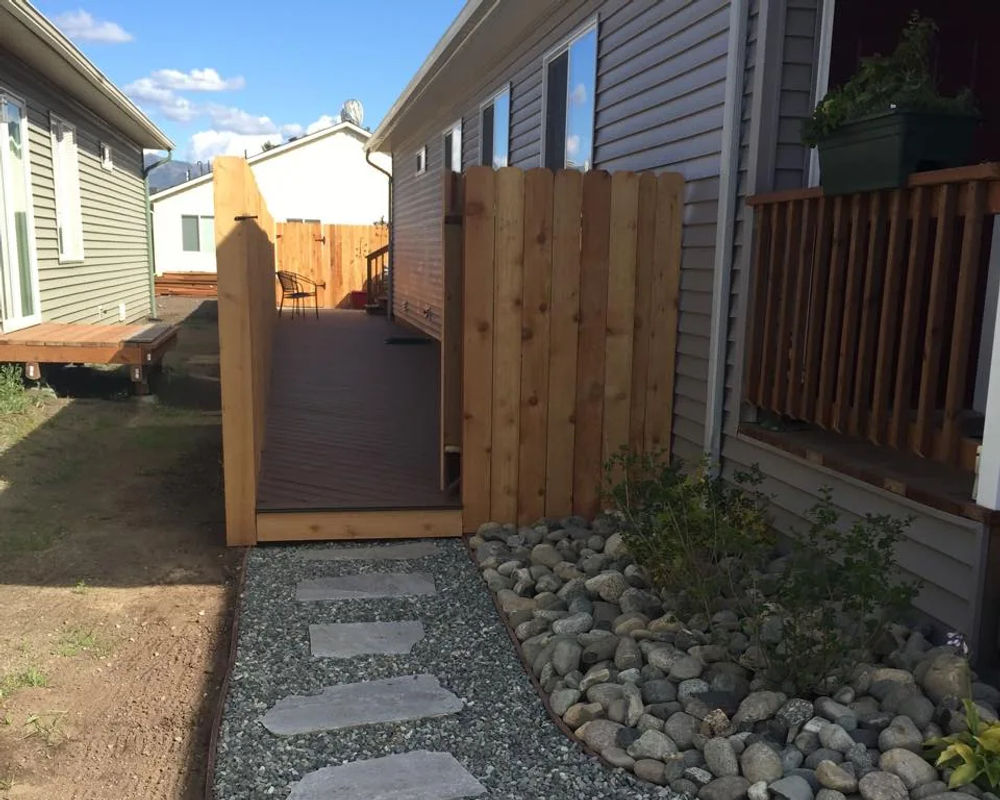Landscape steps set into a graded hillside yard, Eagle River Alaska