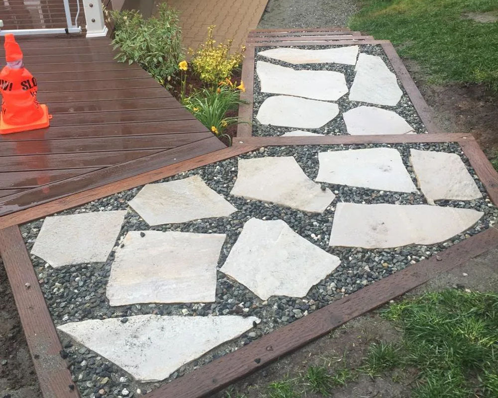 Decorative concrete walkway and steps in a residential landscape, Anchorage Alaska