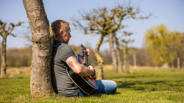 Persoon met gitaar