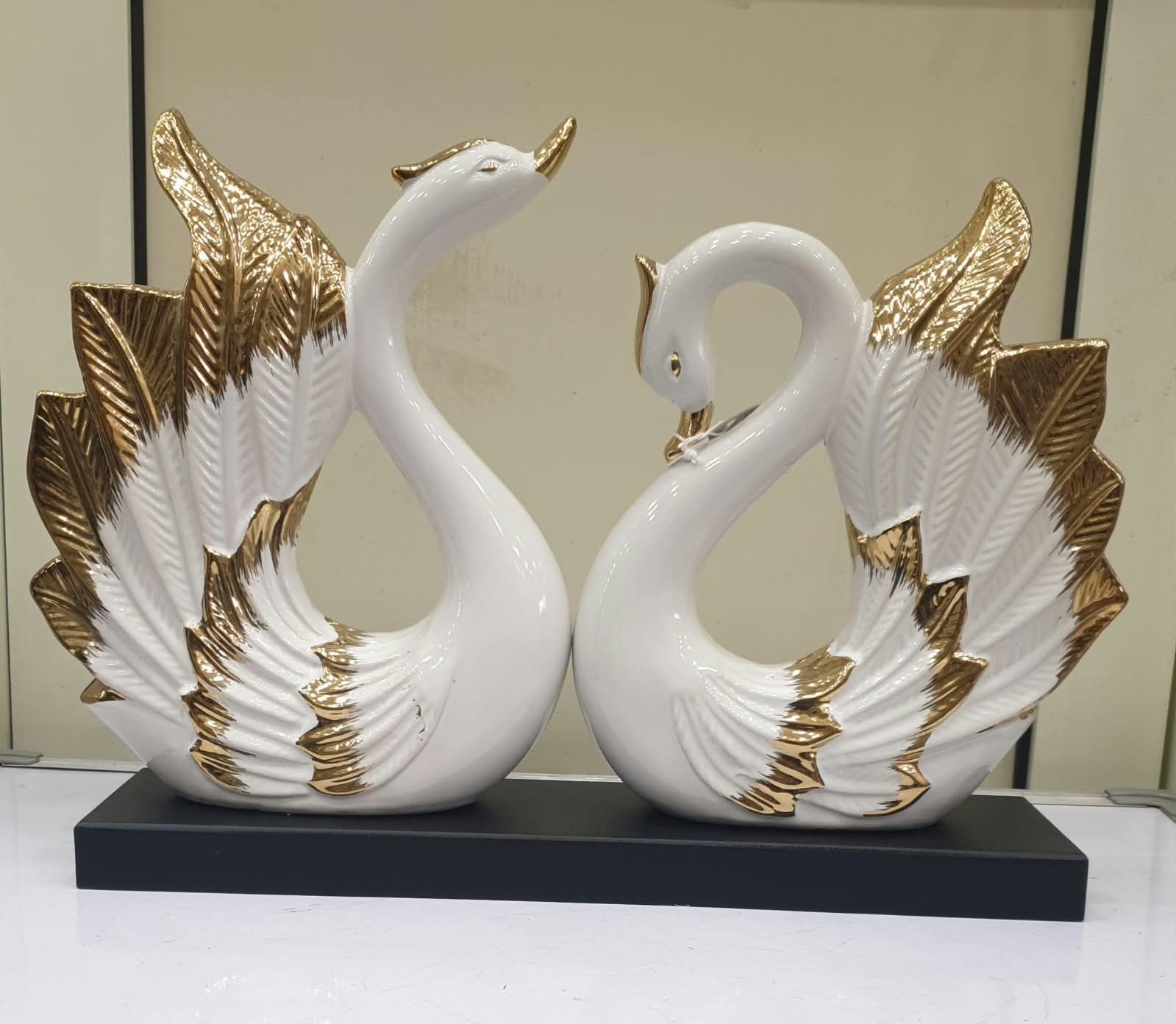 Eternal Elegance Glossy White & Gold Ceramic Swan Couple Figurine on Matte Black Base