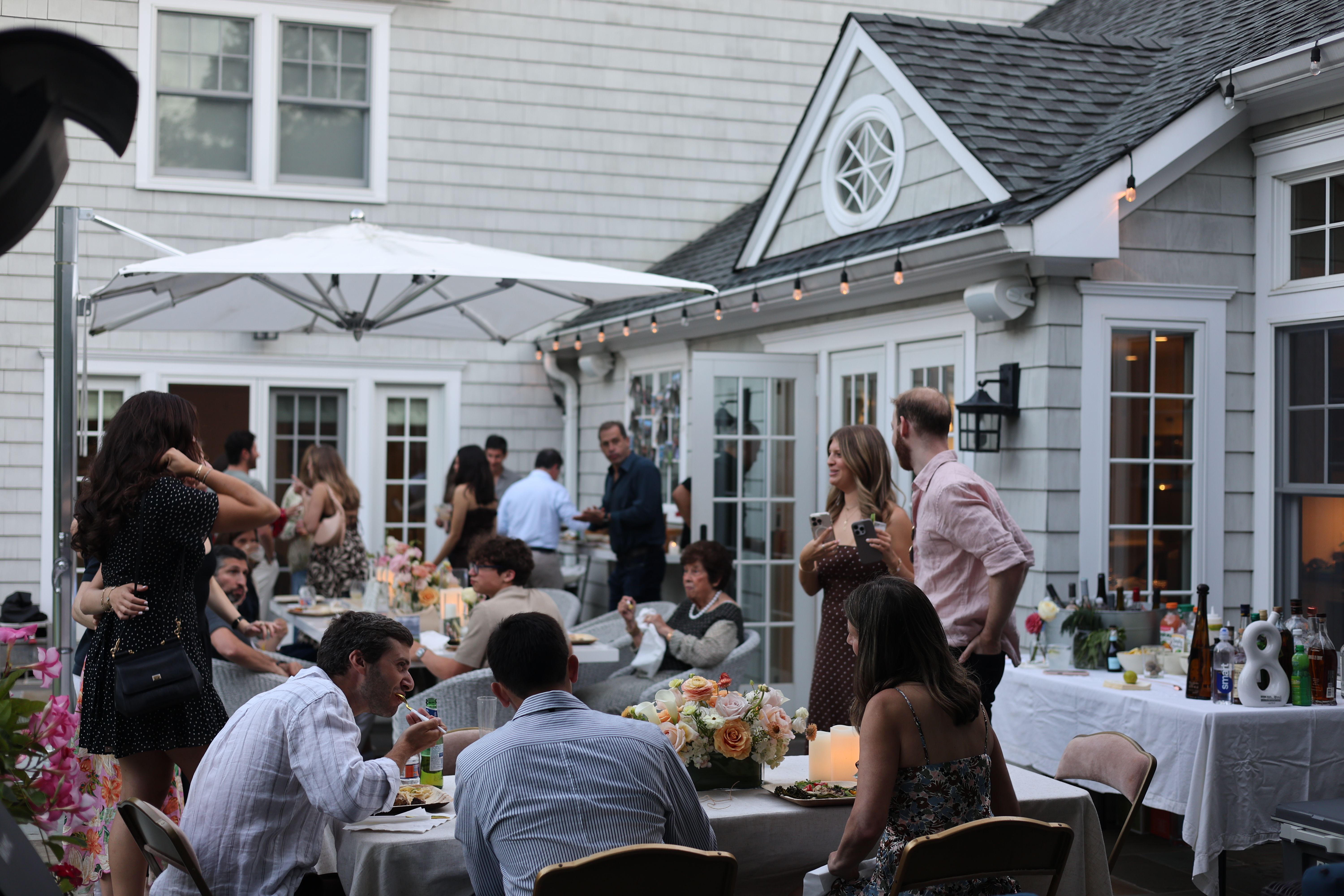 Large backyard dinner gathering hosted by private chef