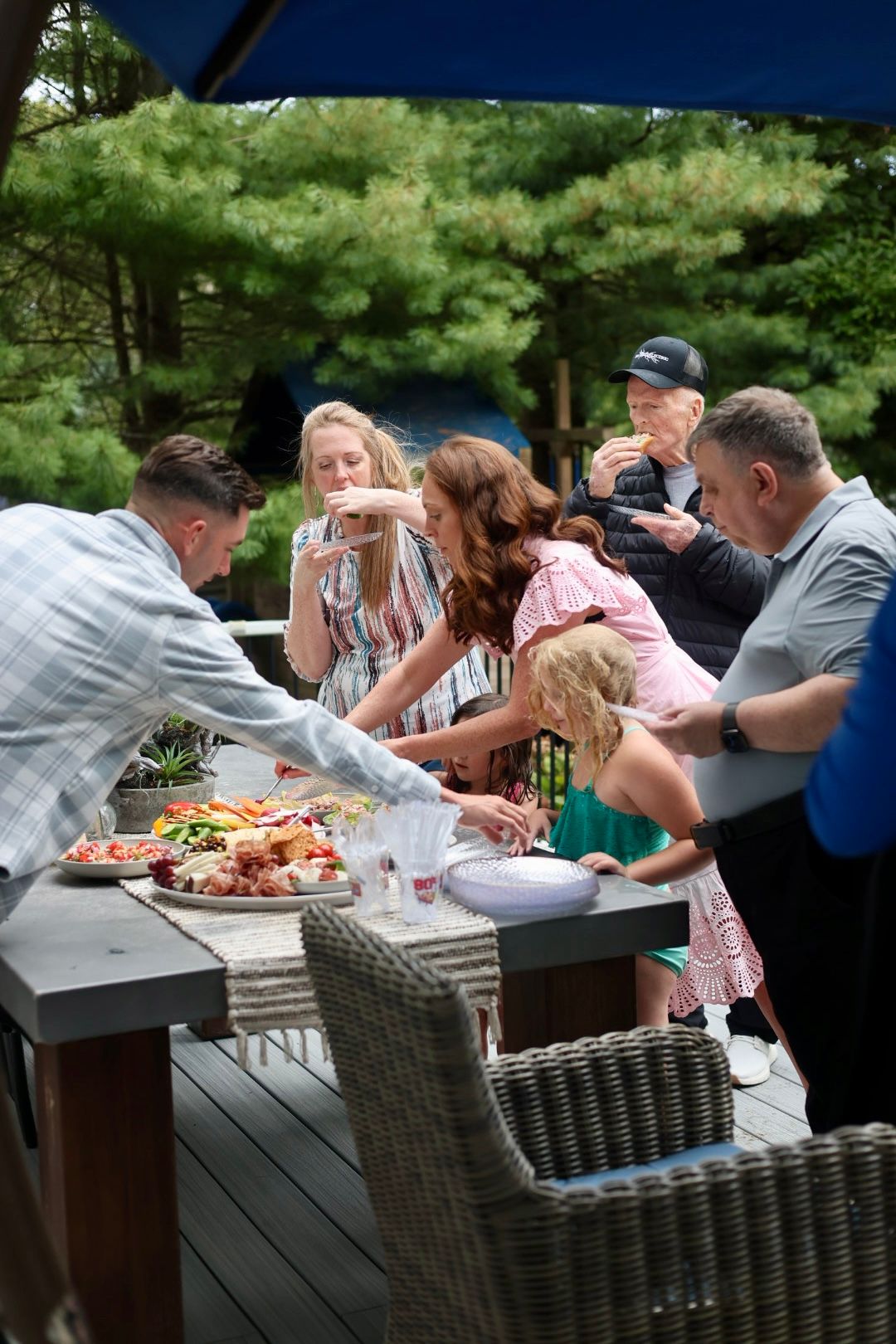 Guests enjoying grazing board at private dinner