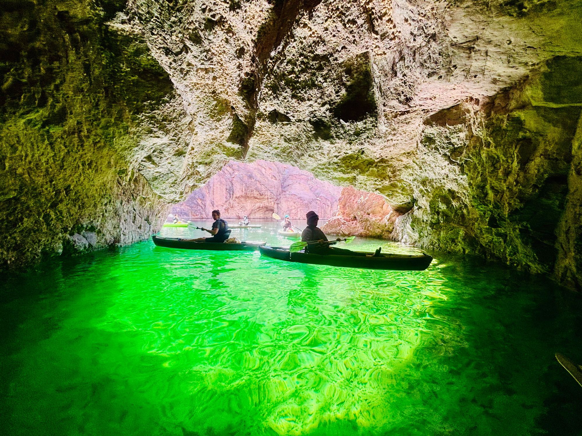 Kayakers entering Emerald Cave on a guided Colorado River tour near Las Vegas.