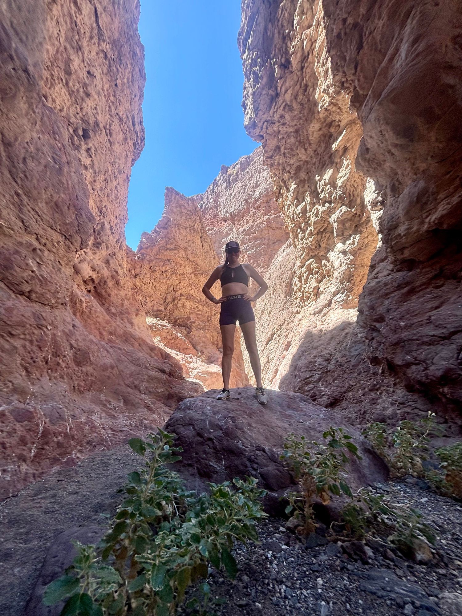 Kayakers exploring a scenic slot canyon hike during a full-day Emerald Cave kayak tour in Black Canyon.