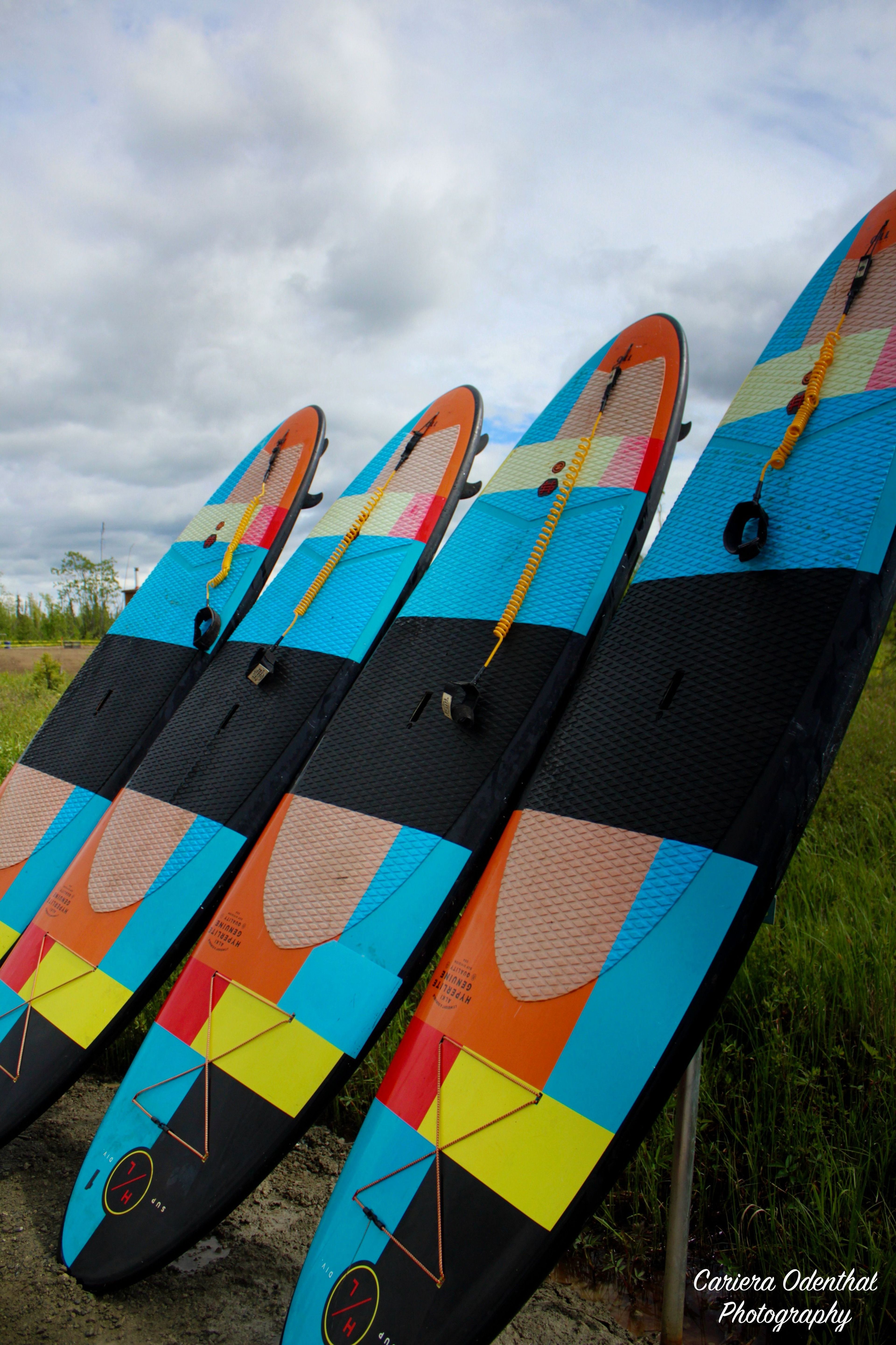 Surf, water ski, and wakeboard in the crystal waters of Big Lake, Alaska, with board rentals from Big Lake Adventure Co. 