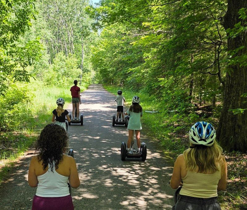 Multi-generation family having fun on a Door County Segway tour