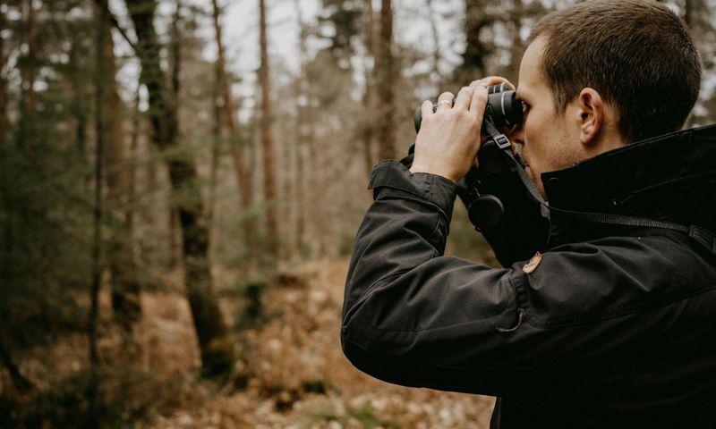 person birdwatching in colorado