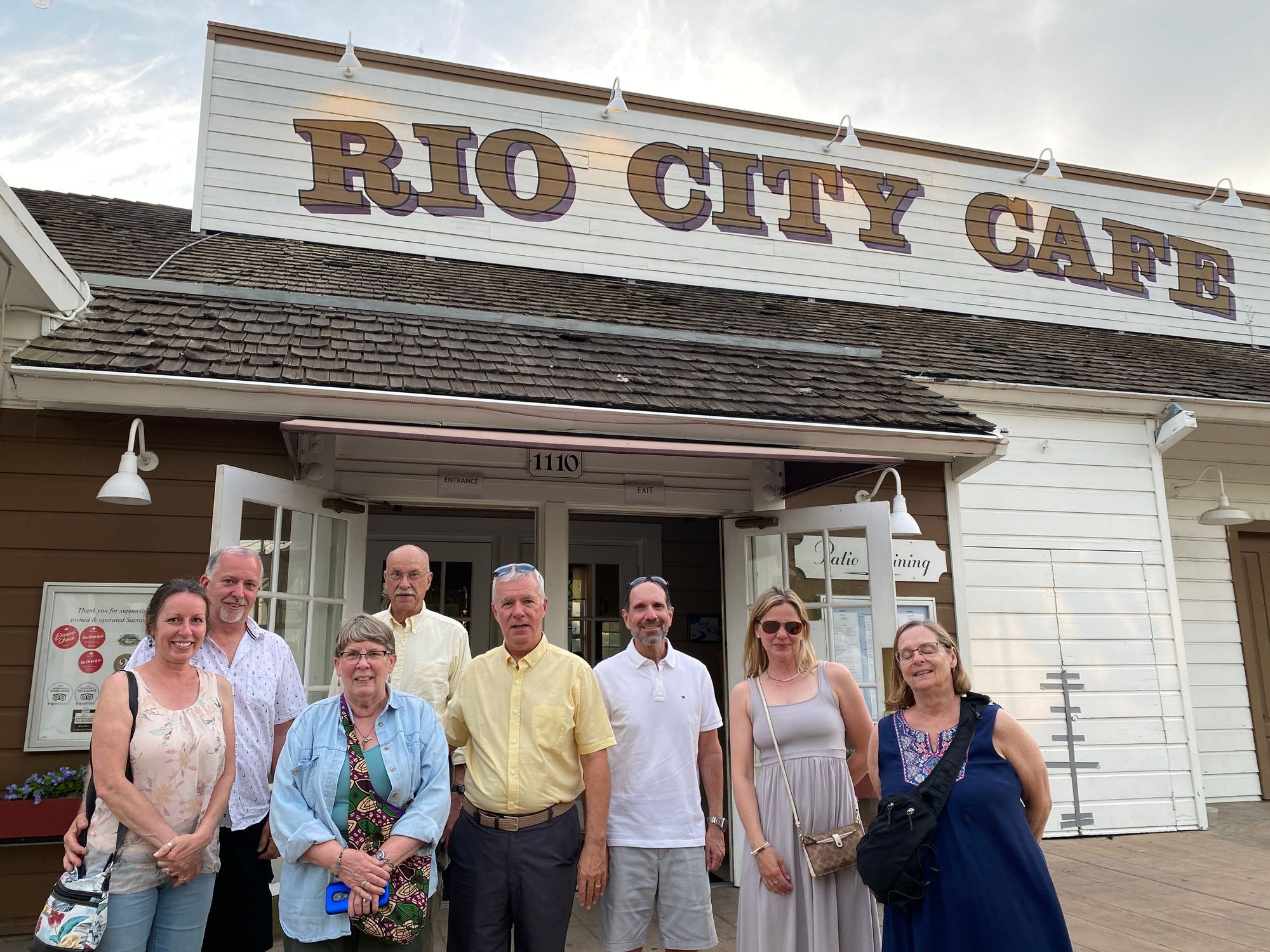 group in front of a building