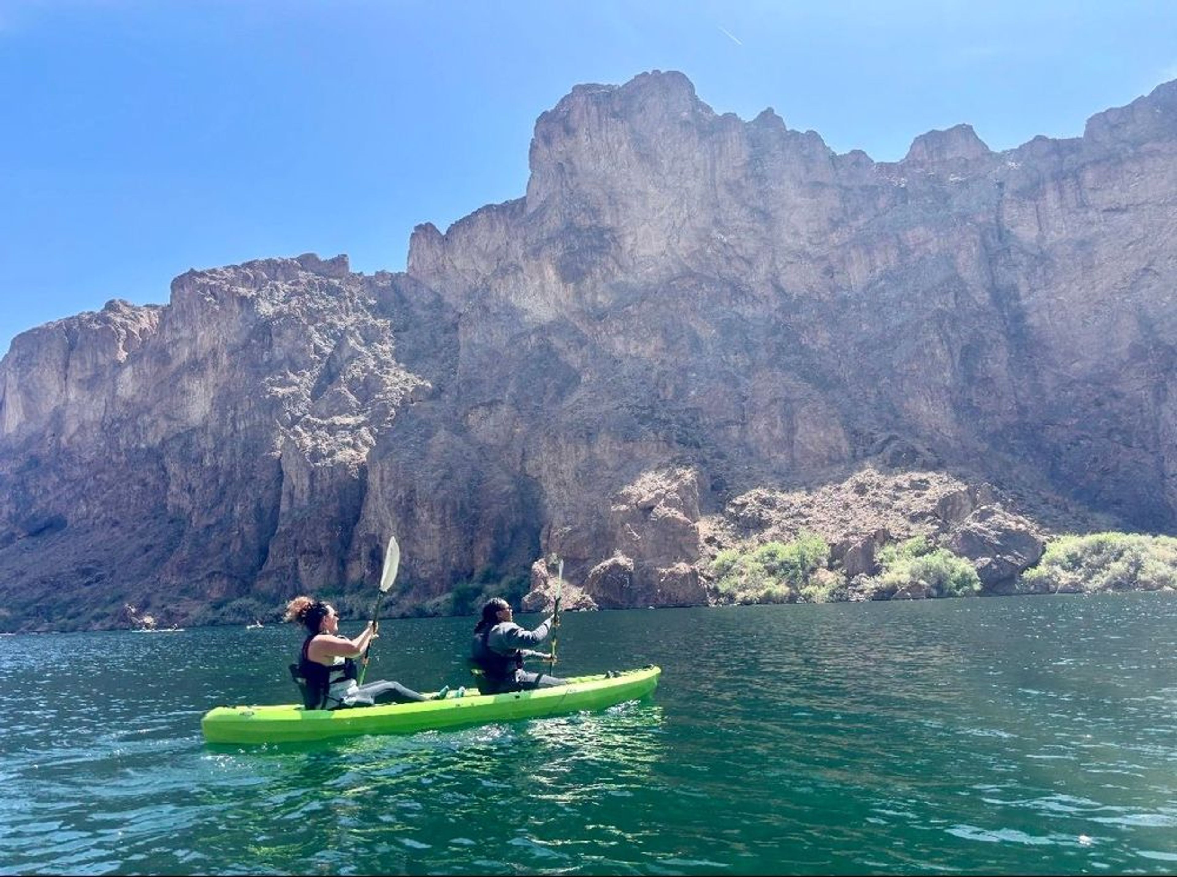 Couple kayaking together on a private Emerald Cave tour through the Black Canyon near Las Vegas.