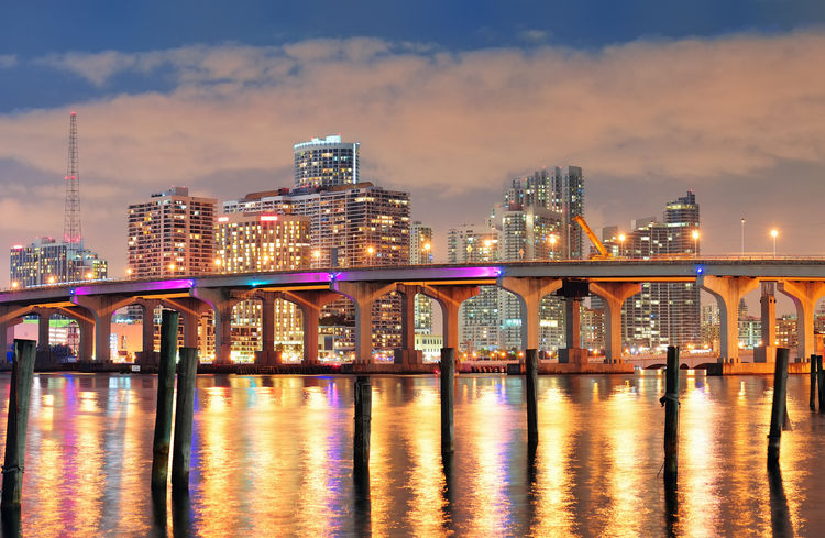 Golden Hour Glamour: Witness the Miami skyline transform with the setting sun, casting a golden glow over the city.