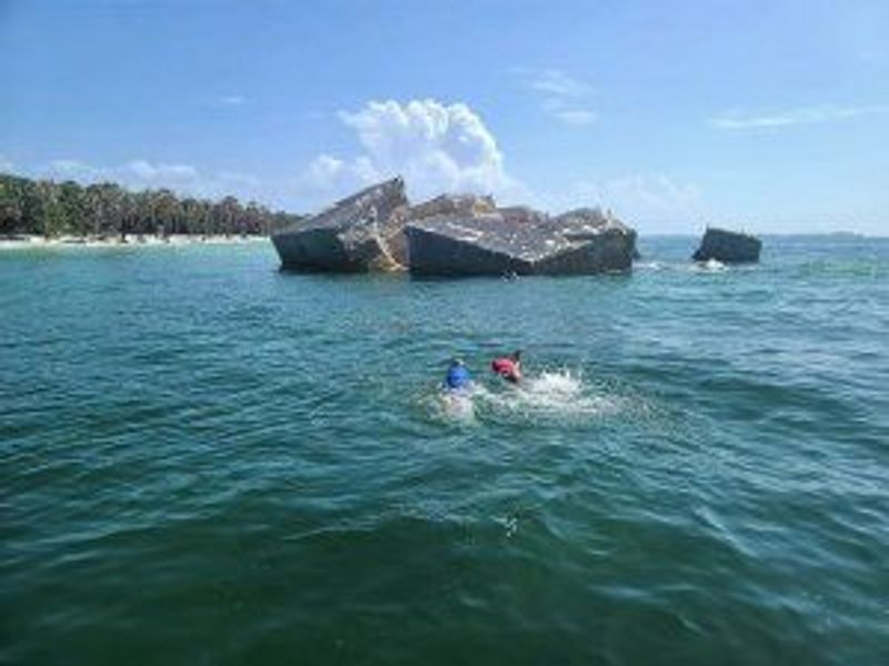 a small boat in a body of water