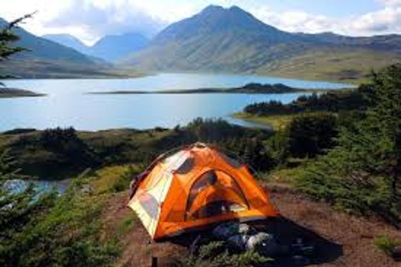 a tent with a mountain in the background
