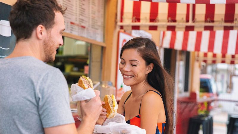 Couple Eating Cuban Sandwich Near Duval St, Key West, Florida