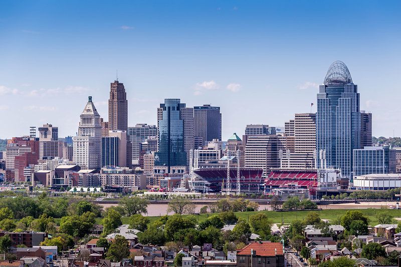 a large body of water with a city in the background
