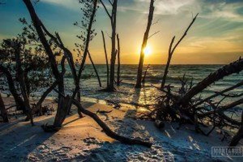 a sunset over a body of water