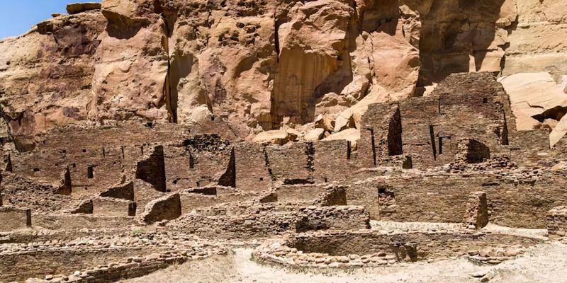 old ruins at the base of a cliff at Chimney Rock National Monument in Colorado