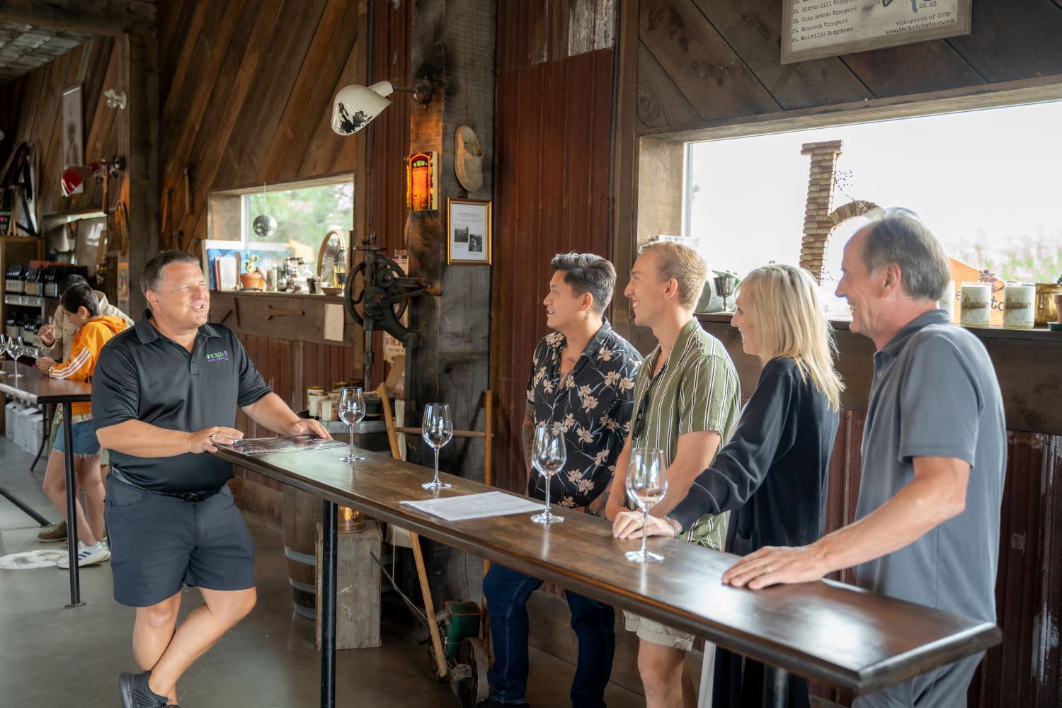 A Wicked Wine Tours and customers at the Hatch Winery in West Kelowna.