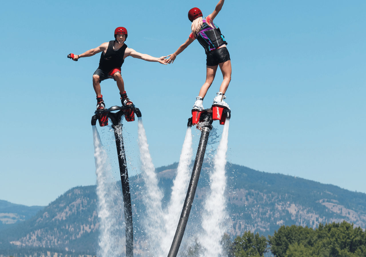 people hovering above water on flyboards in Okanagan