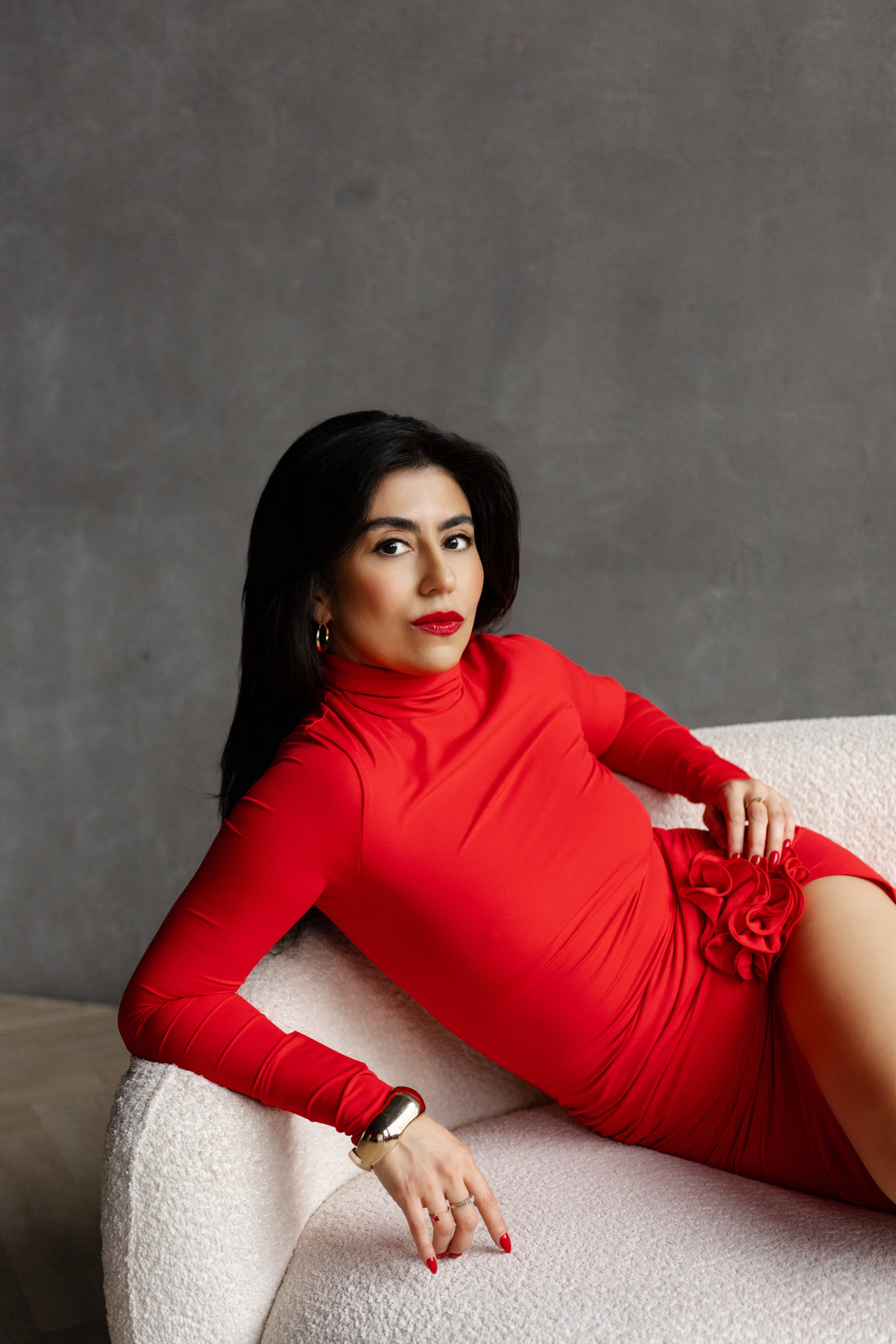 Charlene Lizette wearing a red dress