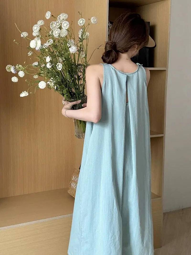 Description Picture 6 of itemSummer New Holiday Style Hollow Out Sleeveless Hanging Neck Dress Solid Loose Backless Dresses Elegant Fashion Women Clothing