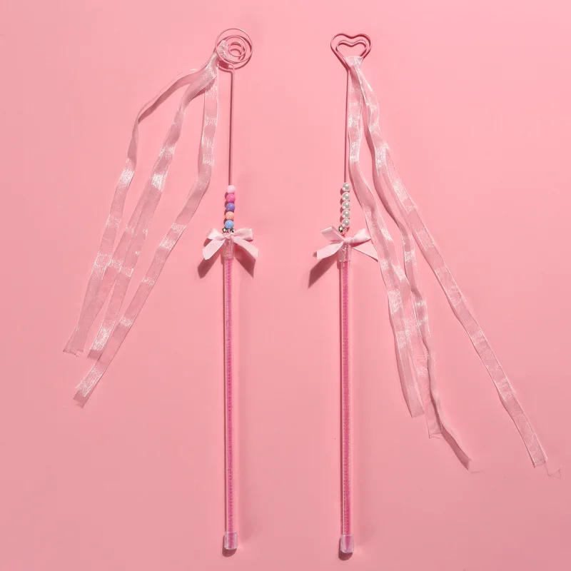 Description Picture 4 of itemPink Cat Teasing Stick with Bell Handmade Bowknot Cat Toy Feather Heart Tassel Streamer Interactive Pet Toy Pet Accessories