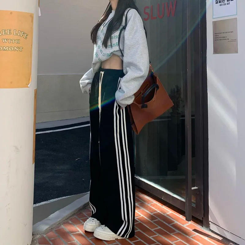 Description Picture 5 of itemZoki Black Striped Sweatpants Women Preppy Style High Waist Loose Casual Trousers Korean Chic Lace Up Streetwear Wide Leg Pants
