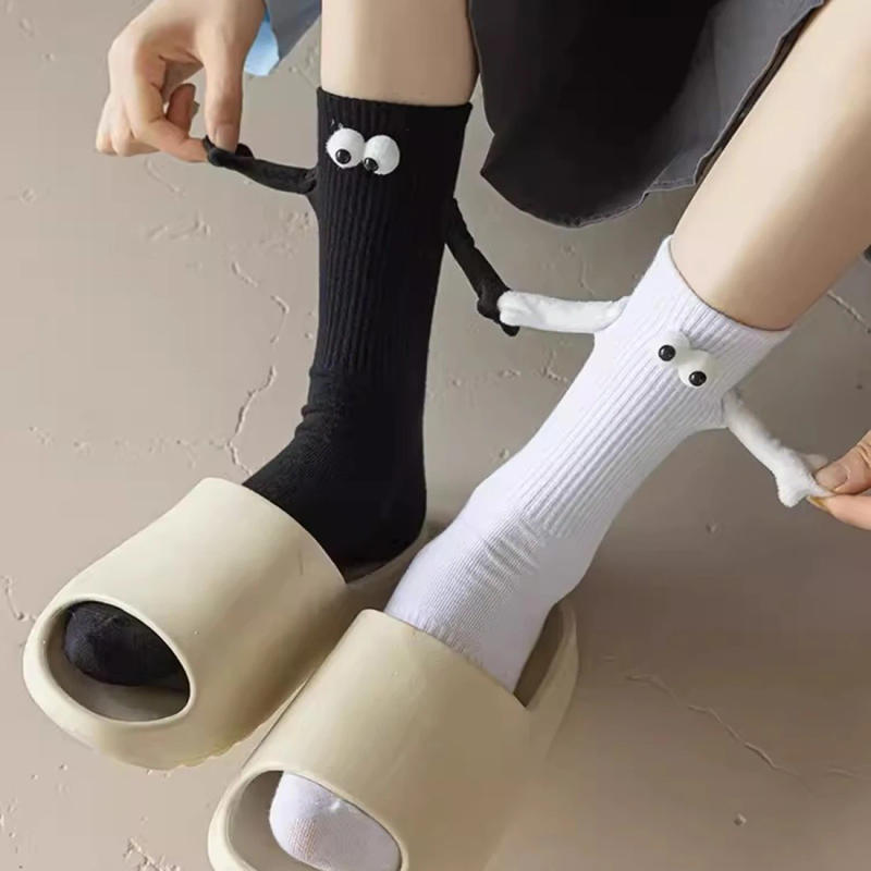 Description Picture 6 of itemFashion Funny Creative Magnetic Attraction Hands Black White Cartoon Eyes Couples Socks 4 Pair Club Celebrity Couple Socks Ins
