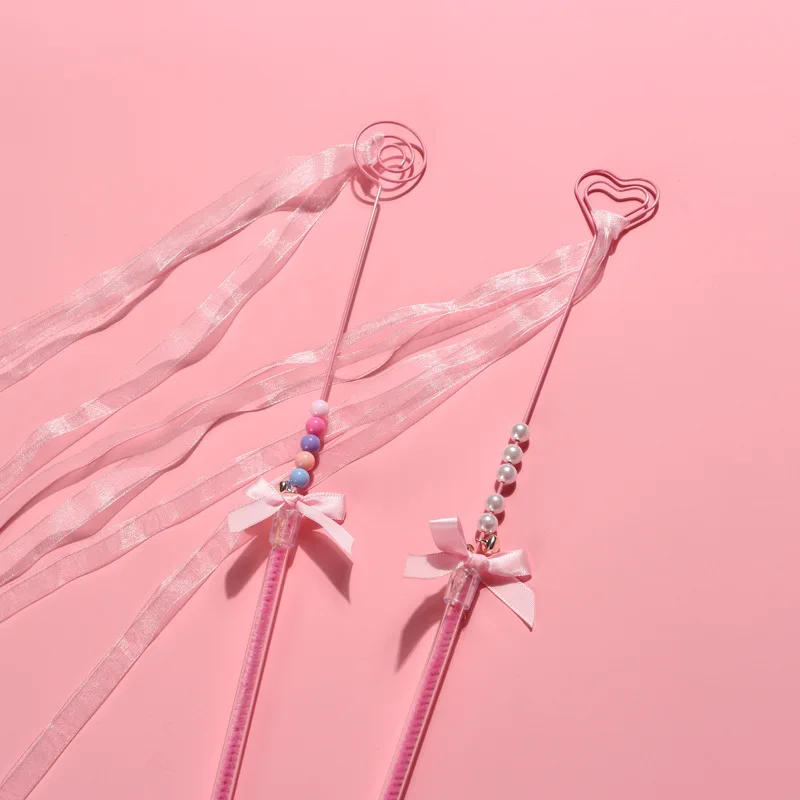 Description Picture 3 of itemPink Cat Teasing Stick with Bell Handmade Bowknot Cat Toy Feather Heart Tassel Streamer Interactive Pet Toy Pet Accessories