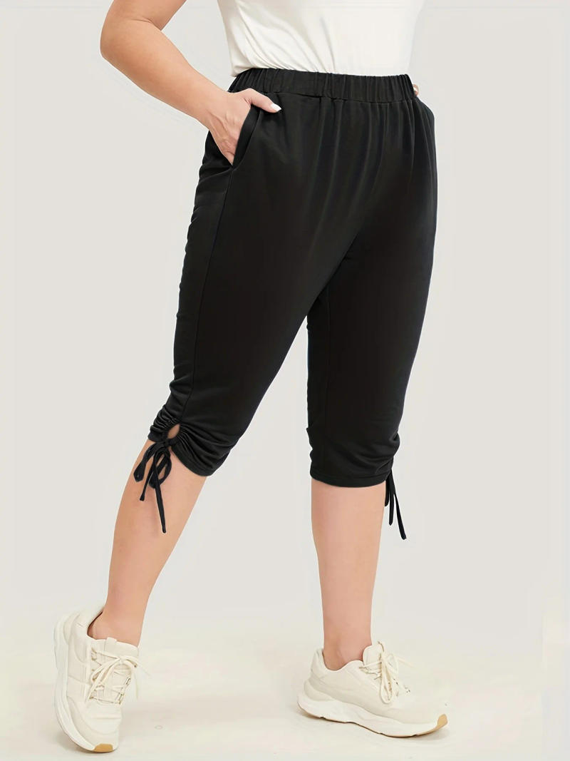 Description Picture 6 of item2023 Summer women plus size High street style pant leg lace-up fashion design solid color medium trousers capri pants
