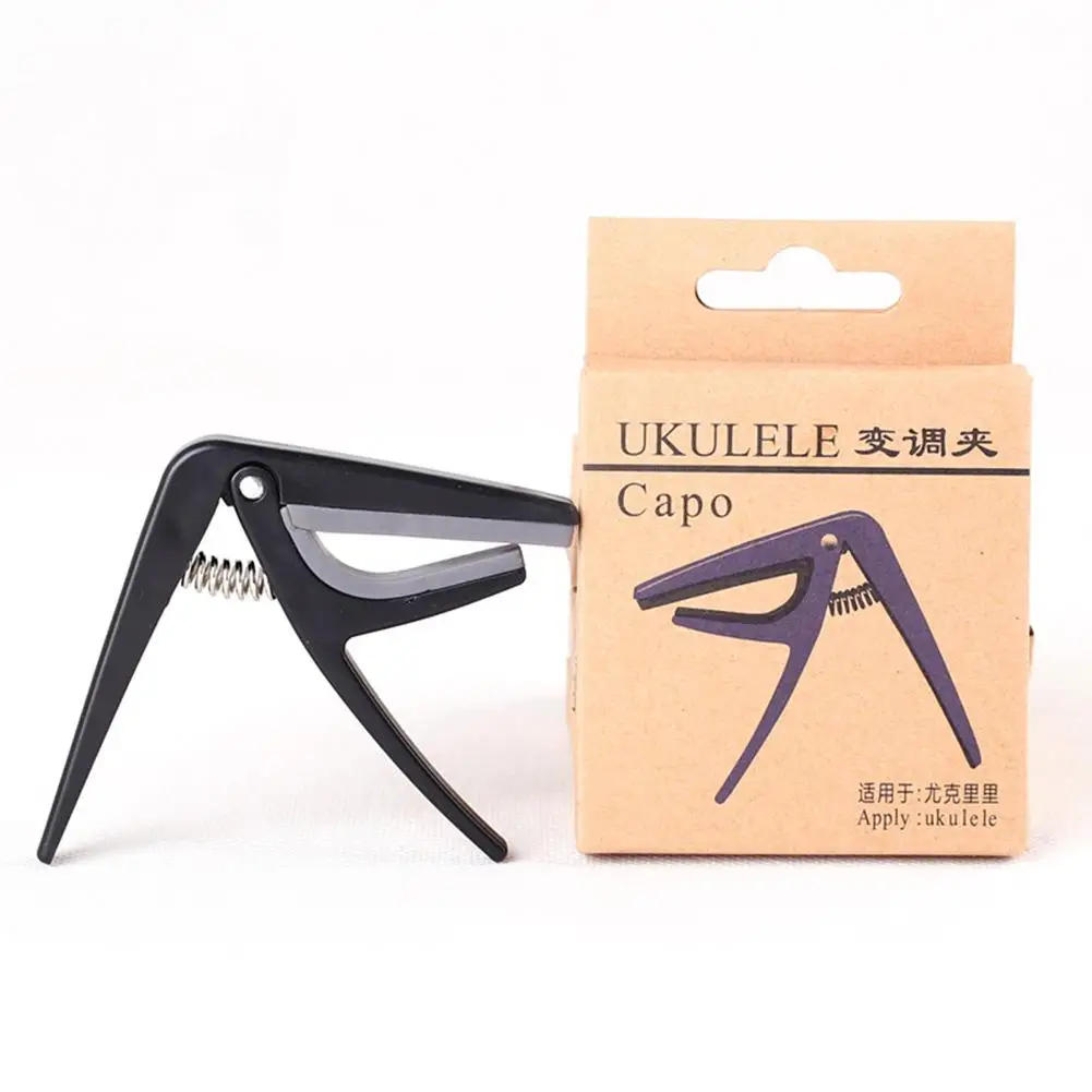 Description Picture 6 of itemProfessional Ukulele Capo 4 Strings Hawaii Guitar Capos Single-Handed Quick Replacement Change Guitar Parts & Accessories