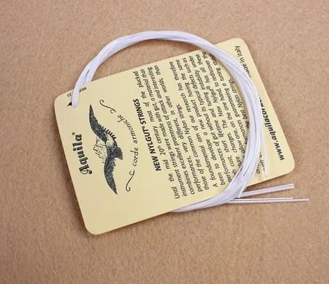 Description Picture 6 of item1-5 SET Ukulele 21 23 4 Strings Hawaii Small Guitar White Aquila Soprano Concert Nylon Parts  Accessories Musical Instruments