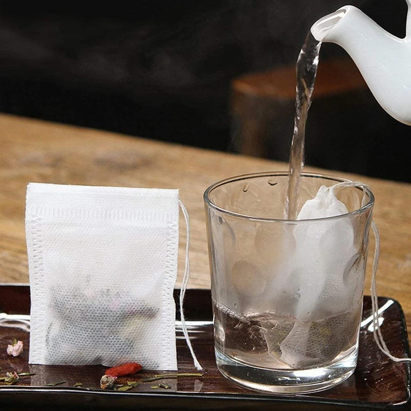 Description Picture 4 of item100 PCS Tea Filter Bags Non-woven Fabric Disposable Teabags Empty Tea Bags Cotton Drawstring Seal Filter Tea Bags for Loose Tea
