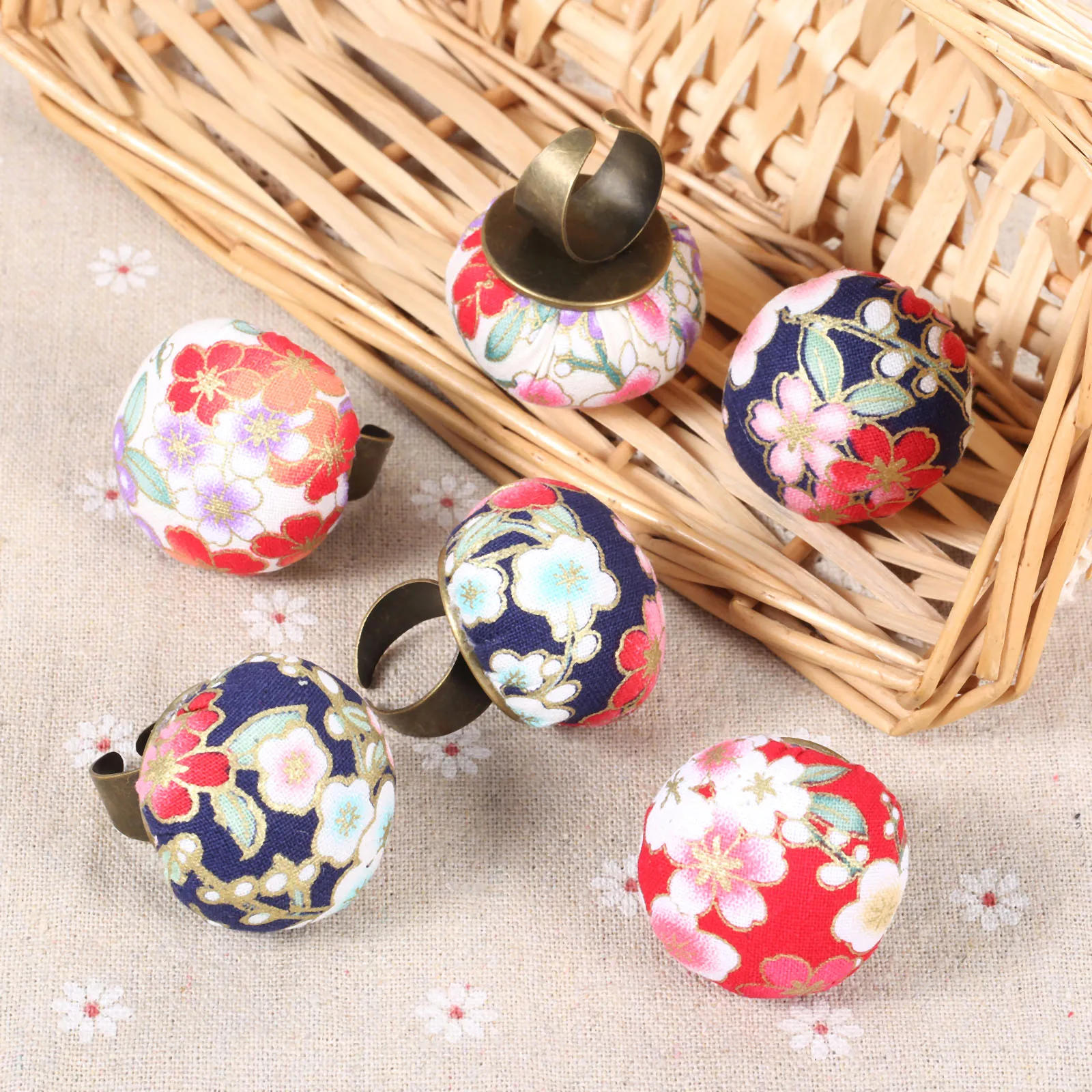 Description Picture 4 of item1Pc Cute Ball Shaped Quilter Crafts DIY Finger Ring Pincushions Holder Sewing Kit Adjustable Floral Pattern Needles Pad Randomly