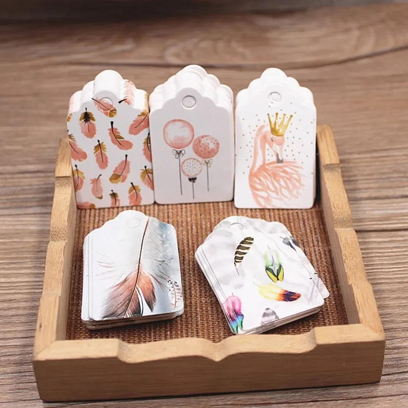 Description Picture 6 of itemParcking tag Scallop shape 5x3cm 100 tag white color  wedding candy gift tags Feathers pattern decoration hang tag party suppile