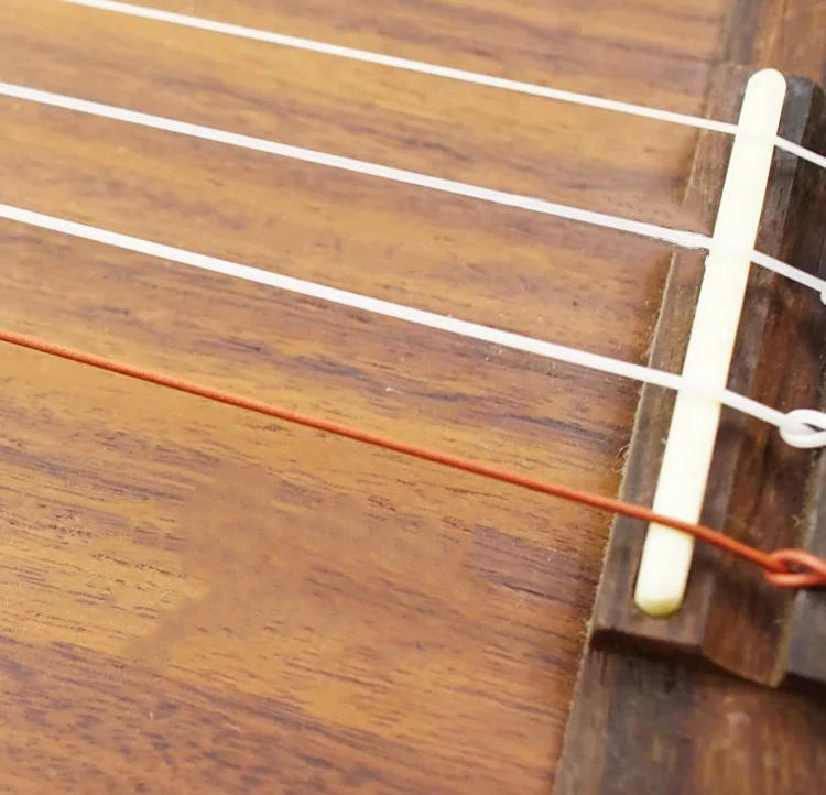 Description Picture 6 of itemLow G Nylon Ukulele String Small Guitar Ukelele 21 23 26 Soprano Concert Tenor Accessories Parts Musical Instruments