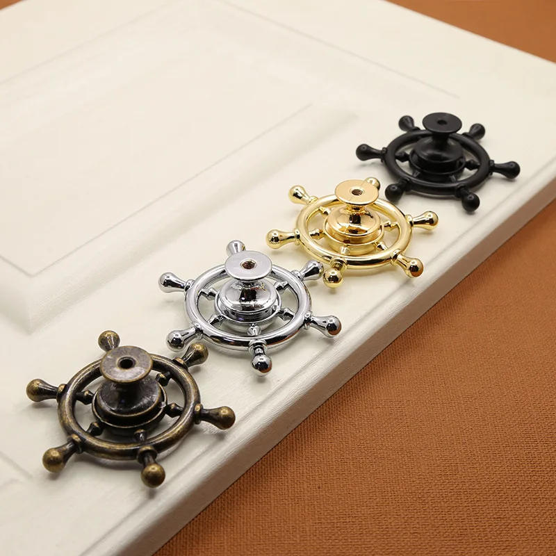 Description Picture 6 of itemZinc alloy fingertip gyro handle wardrobe drawer cabinet door rotating art single hole children cartoon furniture handle