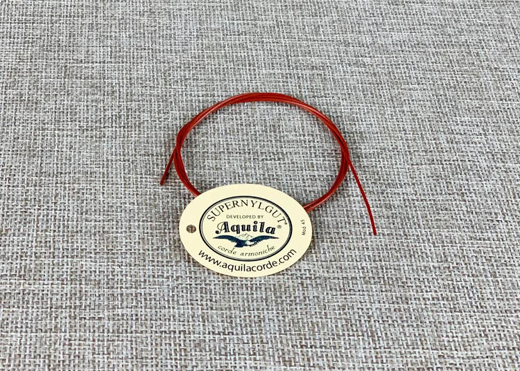 Description Picture 5 of itemLow G Nylon Ukulele String Small Guitar Ukelele 21 23 26 Soprano Concert Tenor Accessories Parts Musical Instruments