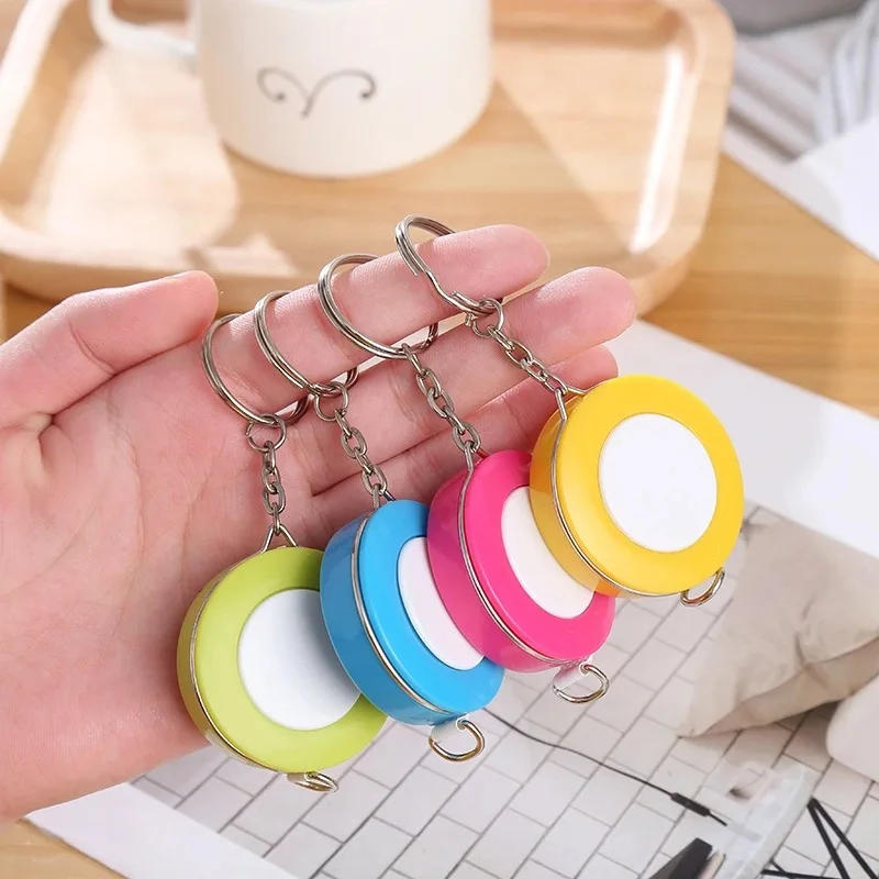 Description Picture 2 of item1PCS 150cm/60" Tape Measures Portable Retractable Ruler Mini Candy Color keychain Children Ruler Centimeter Inch Roll Tape