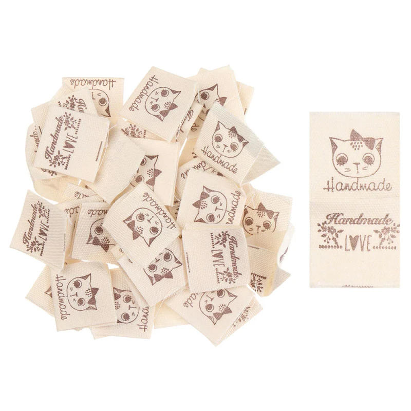 Description Picture 3 of item50Pcs Handmade With Love Cloth Garment Labels Knitting Wool Ball Clothing Tags Cartoon Cat Heart Pattern Woven Knitted Supplies